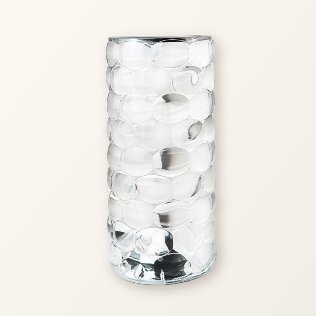 Clear faceted crystal-look acrylic touch lamp, switched off, on a plain cream background
