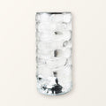 Clear faceted crystal-look acrylic touch lamp, switched off, on a plain cream background