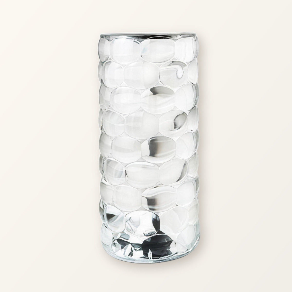 Clear faceted crystal-look acrylic touch lamp, switched off, on a plain cream background