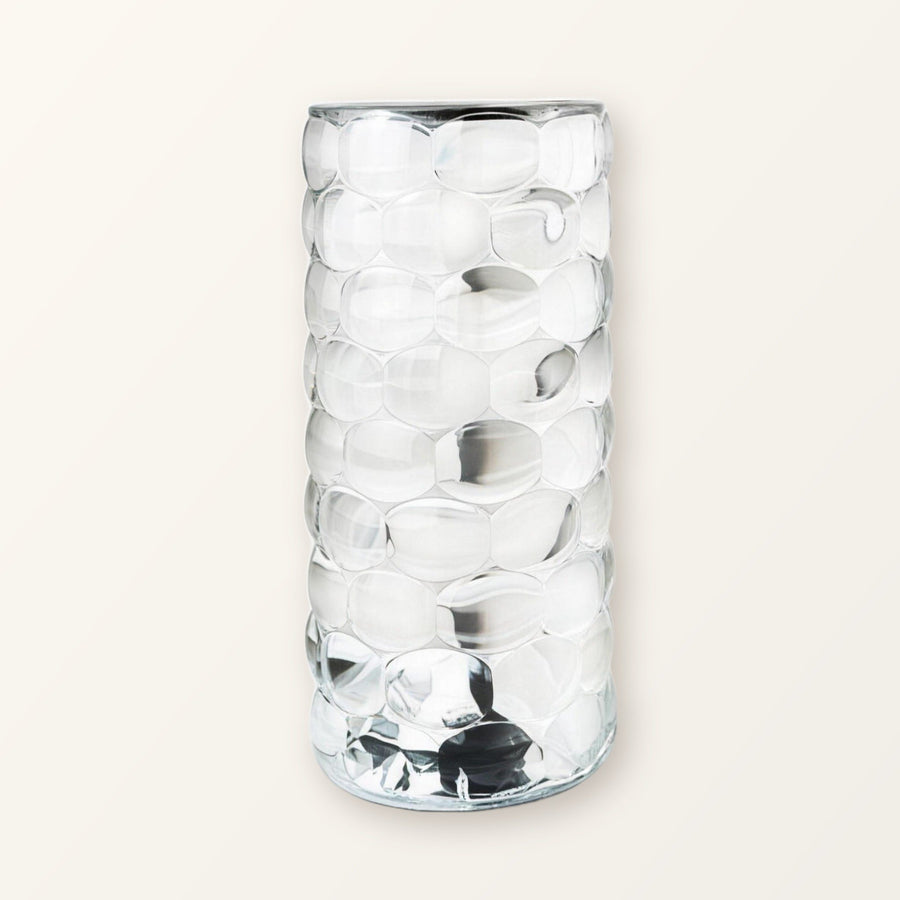 Clear faceted crystal-look acrylic touch lamp, switched off, on a plain cream background