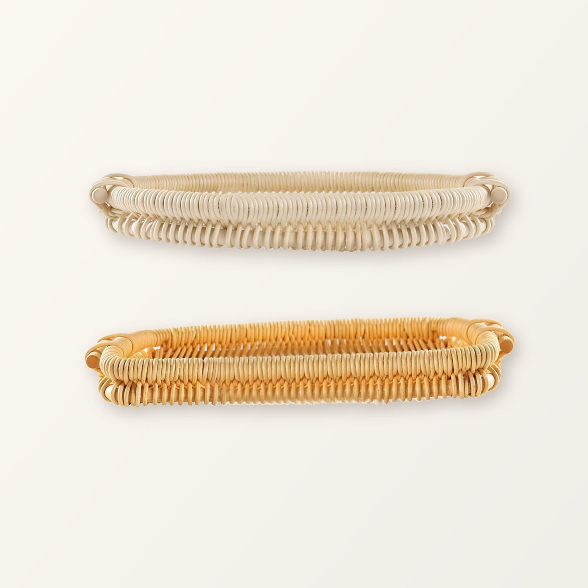 Side view of the round and rectangular rattan trays showing the low 1.4 inch rim