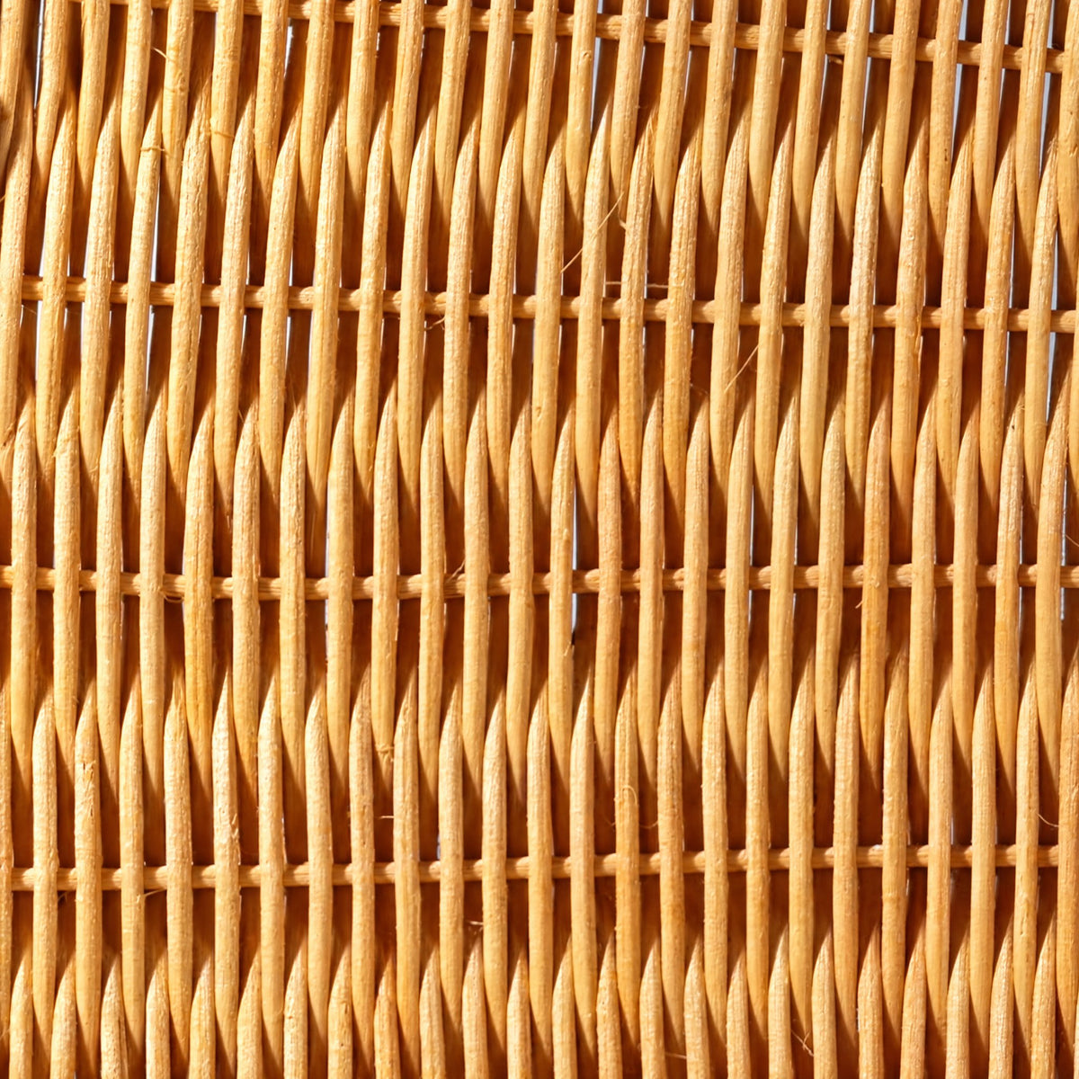 Close-up of the honey rattan weave with its horizontal binding rows