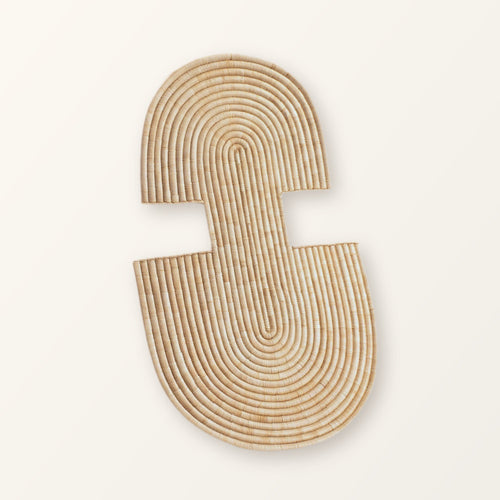 Abstract Wall Mask 2 in natural woven fibre: a coiled arch above a notched, rounded base, on a plain background