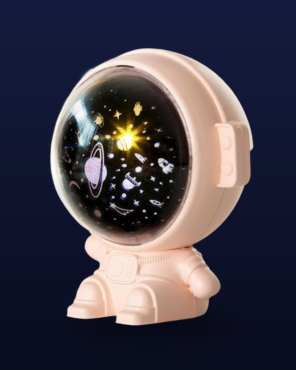 Pink astronaut projector with its visor lit, showing planets, stars and rockets inside the helmet