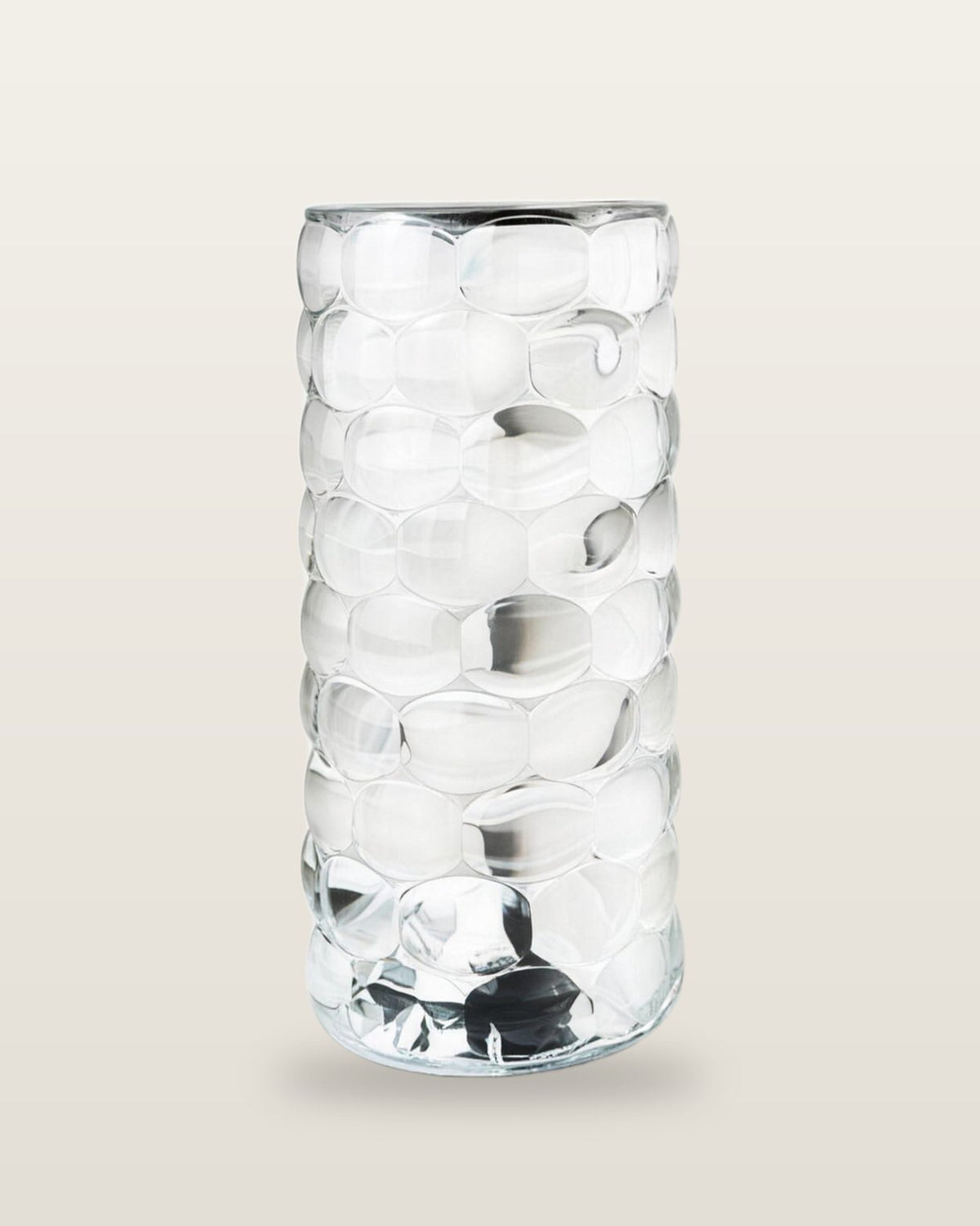 The crystal-look lamp switched off: clear bubble-faceted acrylic body with a silver rim