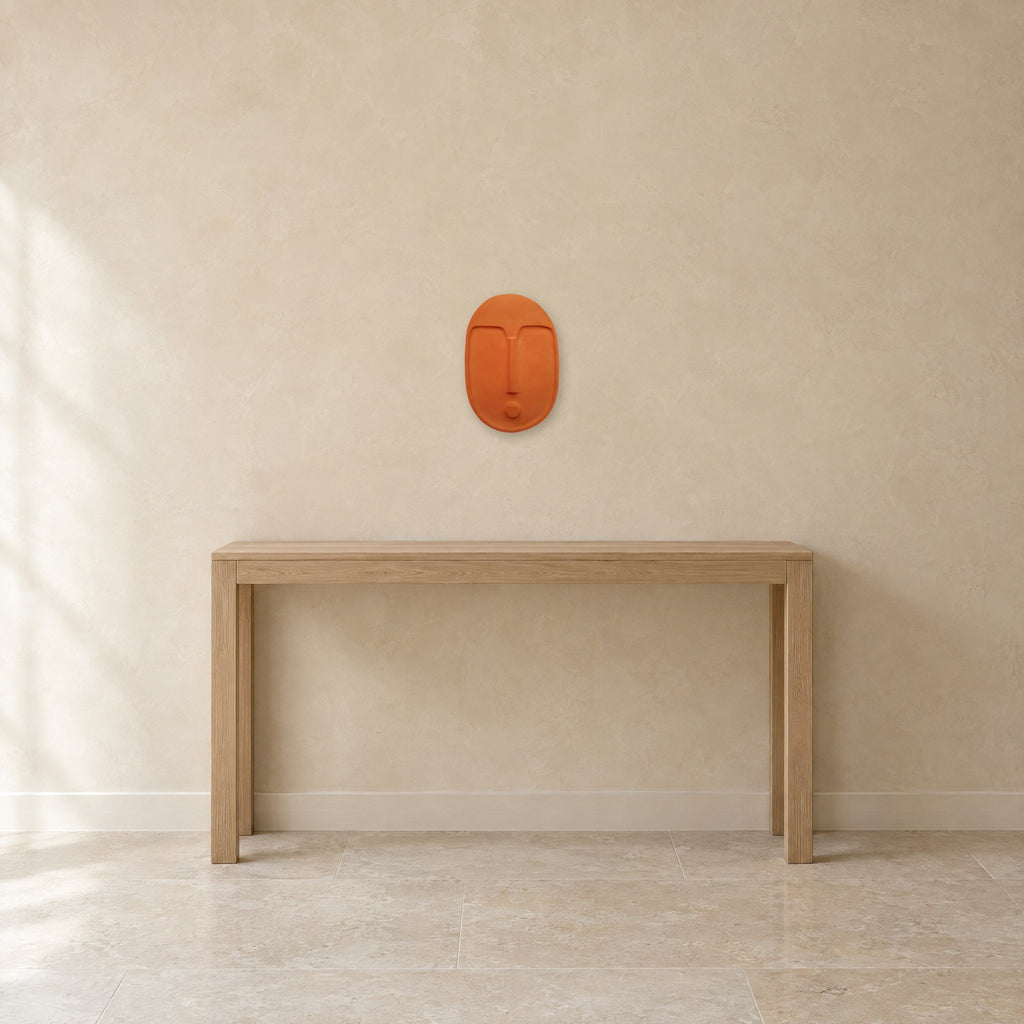 Ceramic wall mask, 11 x 7.5 in, shown to scale above a 47 in oak console