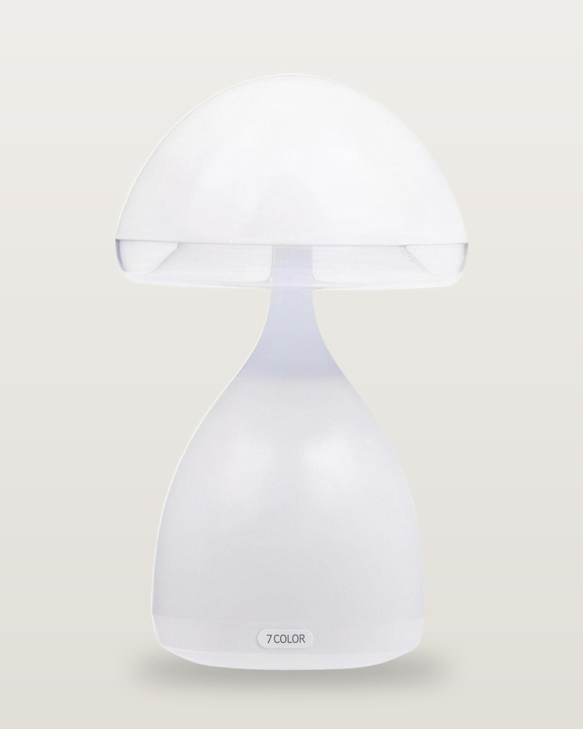 The mushroom lamp switched off: frosted white cap and bell-shaped base with a small printed 7COLOR mark