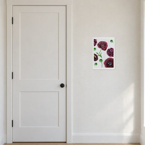 Unframed Black Ranunculus on Snow print, 13 x 19 in size, on a warm white entry wall beside a white door