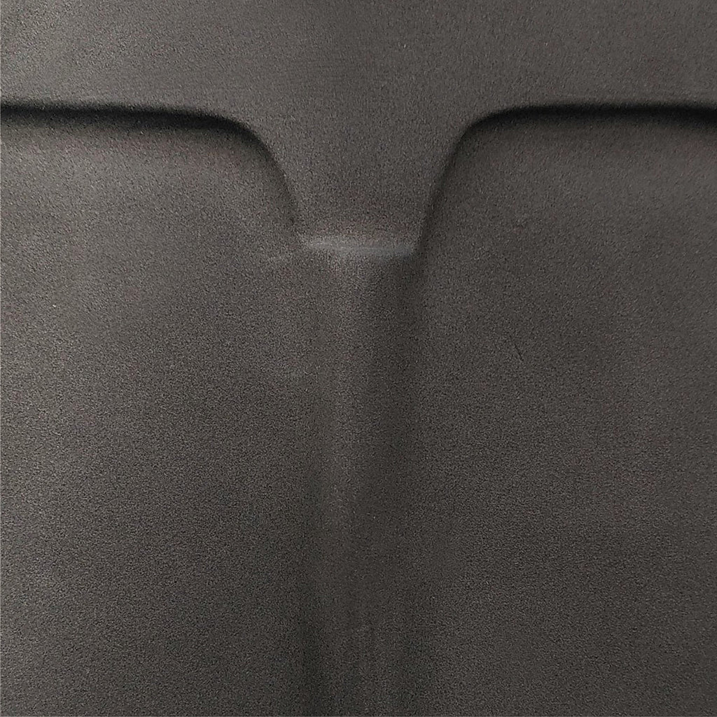 Close-up of the mask's raised brow and nose in textured matte anthracite glaze