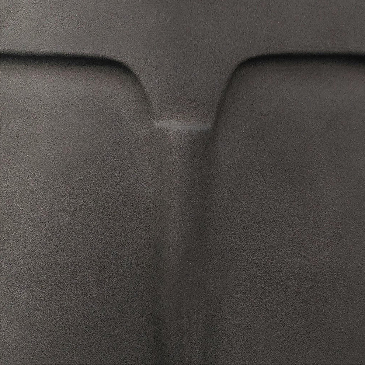 Close-up of the mask's raised brow and nose in textured matte anthracite glaze